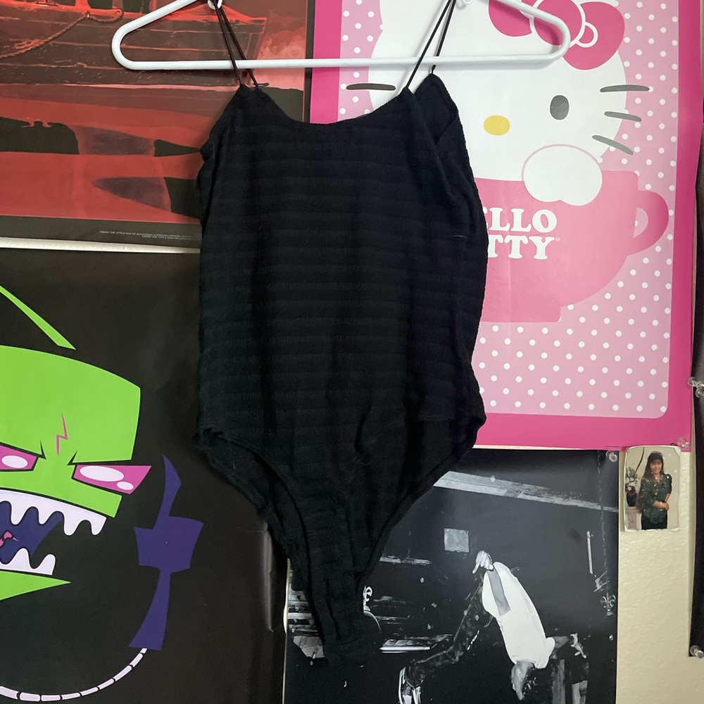 black bodysuit🩻.